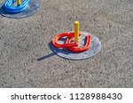 Horse Shoes Game In The Asphalt