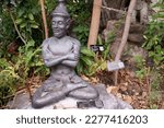 Small photo of Bangkok, Thailand- 8 March 2023 : Contorted hermit statue at Wat Pho, Posture 68 Contortion to relieve colic.