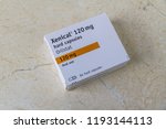 Small photo of Illustrative editorial Xenical Orlistat capsules weight loss drug, copyspace – Bournemouth, United Kingdom – June 15th, 2018