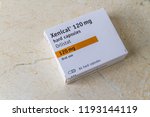 Small photo of Illustrative editorial Xenical Orlistat capsules weight loss drug, copyspace – Bournemouth, United Kingdom – June 15th, 2018