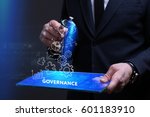 Business, Technology, Internet and network concept. Young businessman working on a virtual screen of the future and sees the inscription: Governance