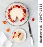 Small photo of Strawberry cake, strawberry sponge cake with fresh strawberries and sour cream on a white background. Top view
