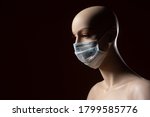 A Mannequin In A Medical Mask....