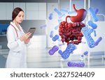 Small photo of Doctor woman. Probiotics for digestion. Gastrointestinal tract. Gastroenterology with tablet. Medical girl is studying probiotics. Woman doctor analyzes microbiota. Caring for stomach or intestines
