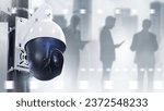 Small photo of Surveillance camera. Tracking city residents. CCTV equipment. Dome CCTV camera on pole. Silhouettes of men with gadgets. CCTV camera on grey. Surveillance for security. Tracking technologies