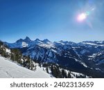 Small photo of A sunny winter day in the Teton Mountain Range. The Teton Range is a mountain range of the Rocky Mountains in North America. One theory says the early French voyageurs named the range les trois tetons