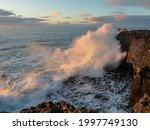 Wave Crashes On A Rock Creating ...