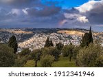 Rainbow over Mount of Olives, with a view of the Old city, with Dome of the Rock on Temple Mount, Mount Scopus, the churches of Ascension and the arab villages in the Kidron valley