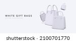 white 3d realistic gift bags... | Shutterstock .eps vector #2100701770