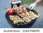 asian men cooking  barbecue... | Shutterstock . vector #1263748090