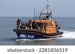 Small photo of Dungeness, Kent,UK, 9th September 2022, Migrants arrive at Dungeness after being picked up at sea by R.N.L.I.