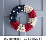 American Flag Wreath On A Blue...