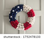 American Wreath On A White Door