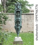 Small photo of Ferrara, Italy - June 6, 2021. Contemporary art pavilion, outdoor statues in what was once the garden of Palazzo Massari. Statue of 1959 entitled Warrior, by the sculptor Mirko Basaldella.