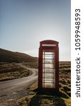 One Red Telephone Box By The...