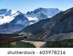 Tourists admiring the glacier valley on the glacier skywalk near the Columbia Icefield in Jasper National Park, Alberta, Canada