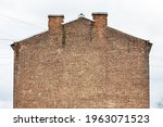 brick wall of a house on a background of sky