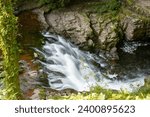 Small photo of Long exposure of a waterfall on the East Lyn river at Watersmeet In Exmoor National Park