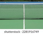 Close Up Tennis Net With Broken Floor  