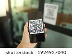 Qr code payment. E wallet. Man scanning tag accepted generate digital pay without money.scanning QR code online shopping cashless technology concept