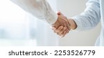 Small photo of Businessman shaking hands successful making a deal. mans handshake. Business partnership Real estate meeting home purchase agreement concept