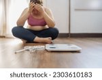 Small photo of Obese Woman with fat upset about her belly. Overweight woman touching his fat belly and want to lose weight. Fat woman worried about weight diet lifestyle.