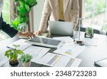 Small photo of Solar panels green energy Business people working in green eco friendly office business meeting creative ideas for business eco friendly professional teaching corporate people sustainable electricity