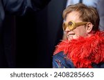 Small photo of Paris, France - August 2, 2022: Sir Elton John wax figure in Grevin museum