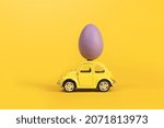 Yellow Retro Toy Car With...