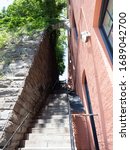 Small photo of Washington DC, USA - June 4, 2019: Image of the "Exorcist steps" the stairs where the character of Father Damien Karras falls to his death in the movie The Exorcist.