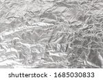 Closeup Of Crumpled Aluminum...