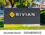 Small photo of Rivian sign logo at headquarters in Silicon Valley. Rivian Automotive is an American electric vehicle automaker and automotive technology company - Palo Alto, California, USA - 2020
