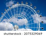 Small photo of Orlando, Florida, US - November 2021: The Wheel at ICON Amusement Park stands over 400 feet with a view from 360 degrees. A Ferris wheel ride and attraction for many tourists on International Drive.