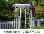 A white wooden archway and...