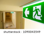 Fire exit sign at  the corridor ...