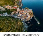 View from above, stunning aerial view of Manarola, the second village of the Cinque Terre coming from La Spezia. Manarola is the most picturesque village, made up of colorful houses. 