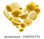 Yellow lemons in the shape of a heart on a white background