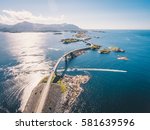 Aerial drone shot of the world famous Atlantic Road is known as ”The Road in the Ocean” in Norway. This fantastic and spectacular road and bridge is a very popular tourist attraction.