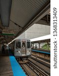Small photo of Chicago, USA: August 18, 2018: Elevated Railway Train and Station, Chicago