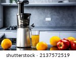 Small photo of electric juicer on the kitchen table