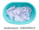 Small photo of Laundry concept, white shirt soaking in water with detergent water dissolution, washing cloth in basin