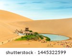 Tourists from all over the country travel to Mingsha Mountain and Crescent Moon Spring Scenic Spot in Dunhuang City