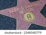 Small photo of Hollywood (Los Angeles), California – May 30, 2023: Star of OZZIE and HARRIET NELSON on Hollywood Walk of Fame, Hollywood Boulevard
