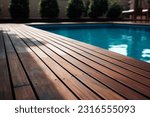 Empty wooden deck with swimming ...