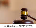 wooden judge gavel on table as symbol of justice for use in legal cases judicial system and civil rights and social justice concept with judge. concept of legislation to judge lawsuits with justice.

