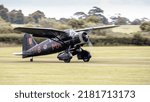 Small photo of Old Warden, UK - 3rd July 2022: A vintage Westland Lysander world war 2 recconaissance aircraft lands on grass airfield