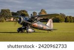 Small photo of old Warden, UK - 2nd October 2022: A vintage Westland Lysander, a British army co-operation and liaison aircraft taxies along the grass airfiled after landing