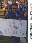 Small photo of “Flush the turd on Nov. 3, “ reads an anti-Trump poster from women’s march. January 18, 2020, Sacramento California.￼