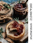 Small photo of Belgian duck liver pate with onion marmalade jam confiture. Fresh homemade chicken liver pate with greens. banner, menu, recipe place for text, top view.