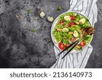 Small photo of Fresh salad with mussels, quail, egg, conjugate, lime, spinach, lettuce, cherry tomatoes and microgreen. Dietary salad. banner menu recipe place for text, top view.